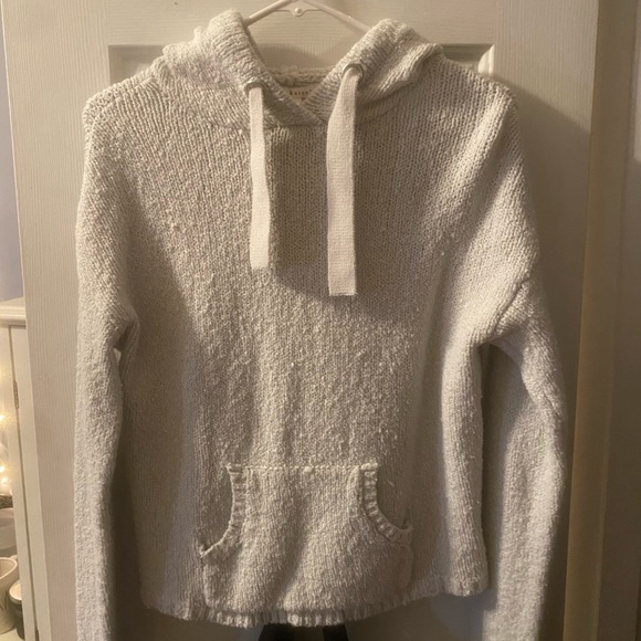 Pull col montant en laine bleu marine boutons épaule femme
